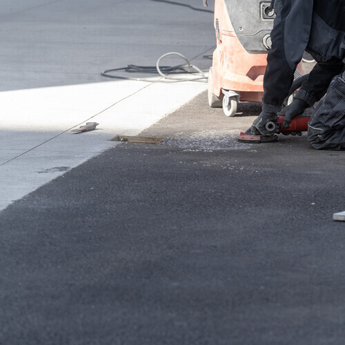 work being done on a commercial roof